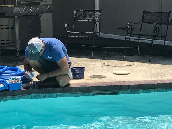 Beautiful pool being cleaned