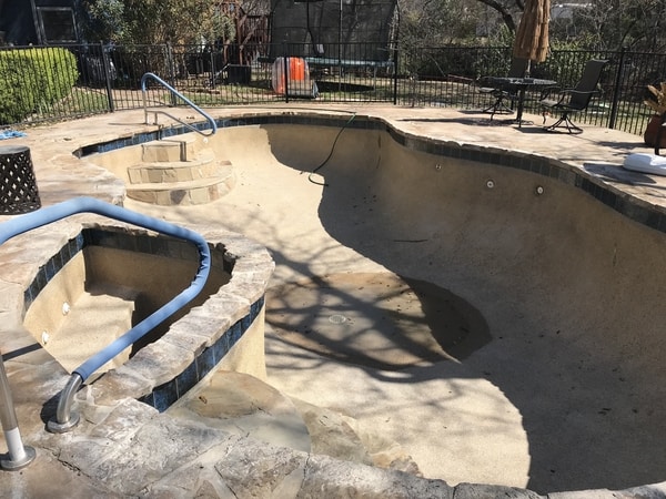 A residential pool after demo has been completed