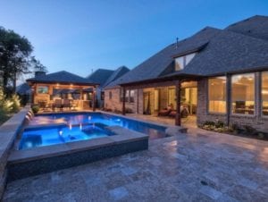 A gorgeous custom built pool at sunset.