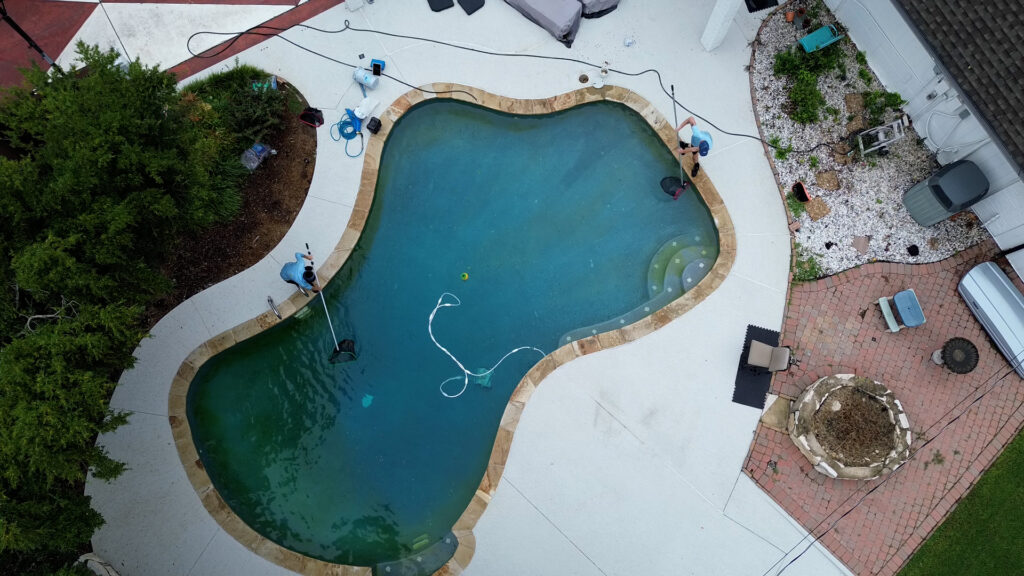Pool service in backyard